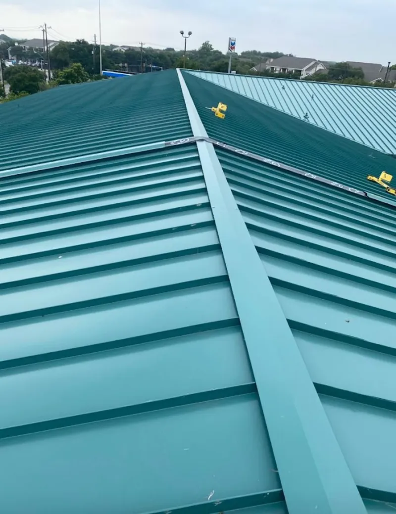 Green commercial metal roof ridge and valley for Metal Roof Repair in Deerfield