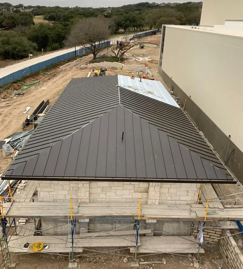 Metal roof new construction with scaffolding in Deerfield